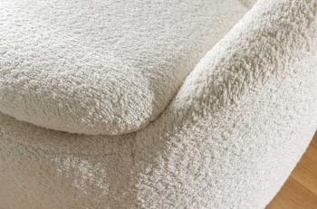 draaibare fauteuil wit bouclé
