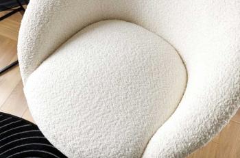 draaibare fauteuil wit bouclé
