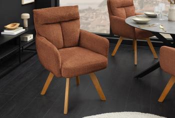 Eetkamerstoel roestbruin bekleding houten poten draaibaar