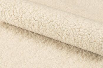 trendy fauteuil bouclé creme