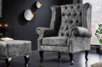 Oor fauteuil grijs fluweel chesterfield look