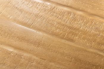 Detail van blad van ovale tafel mangohout 240 cm